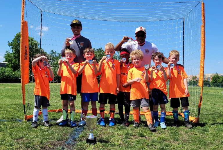 Programs PHOTO 2025 05 19 16 57 05 e1751327600945 - DC Way Soccer